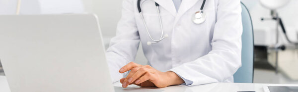 Panoramic Shot Professional Female Doctor Working Laptop Clinic Stock Photo