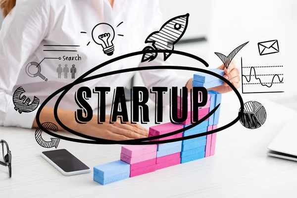 Cropped view of businesswoman stacking marketing pyramid from building blocks on table, startup illustration — Stock Image Cropped View Businesswoman Stacking Marketing Pyramid Building Blocks Table Startup Stock Picture