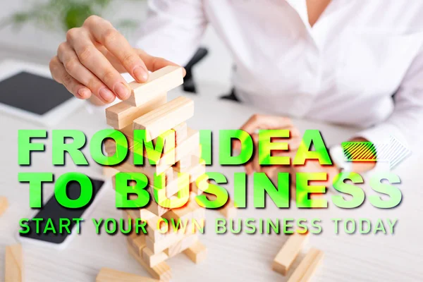 Selective focus of businesswoman playing blocks wood tower game at table, from idea to business illustration — Stock Image Selective Focus Businesswoman Playing Blocks Wood Tower Game Table Idea Stock Picture