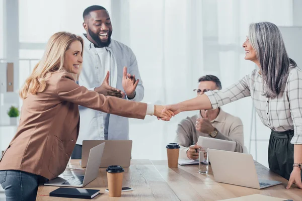 Smiling Multicultural Colleagues Shaking Hands Meeting Creative Agency — Stock Photo, Image