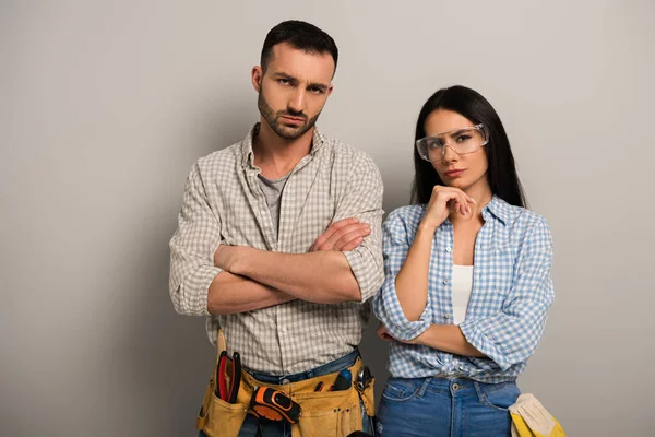 Thoughtful Manual Workers Crossed Arms Grey — Stock Photo, Image