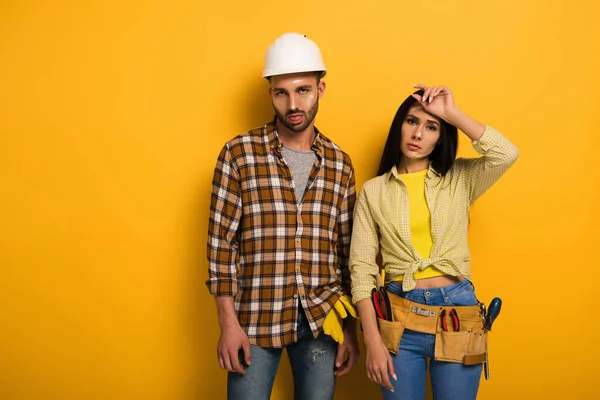 Tired Professional Manual Workers Standing Yellow — Stock Photo, Image