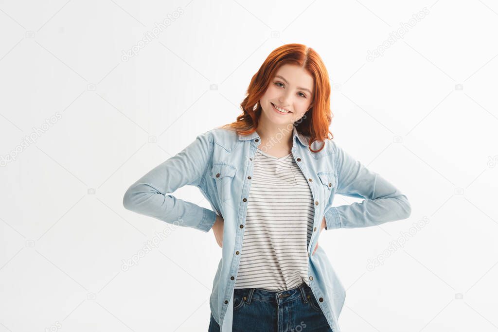 beautiful happy redhead teen girl in denim clothes, isolated on white