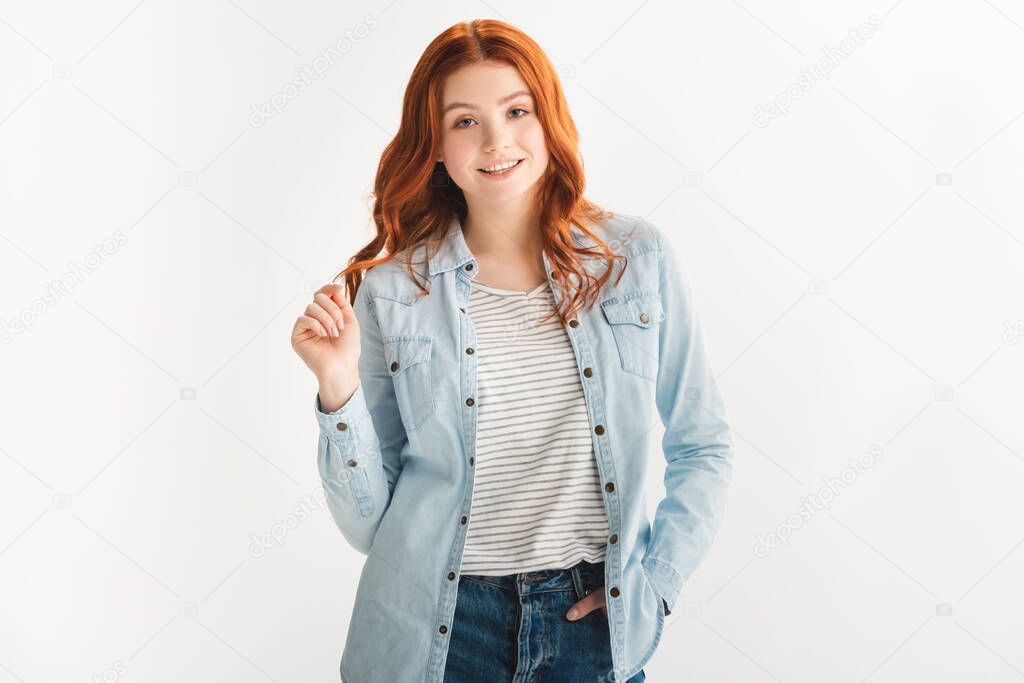 beautiful redhead female teenager in denim clothes, isolated on white
