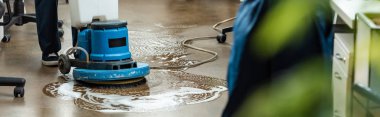 cropped view of cleaner washing floor with cleaning machine, panoramic shot clipart