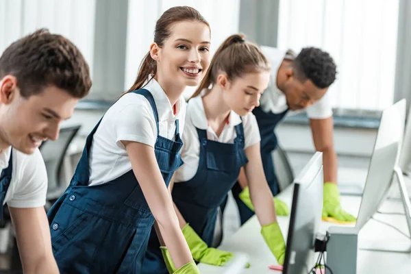 Team Young Multicultural Colleagues Wiping Desks Rags Office — Stock Photo, Image