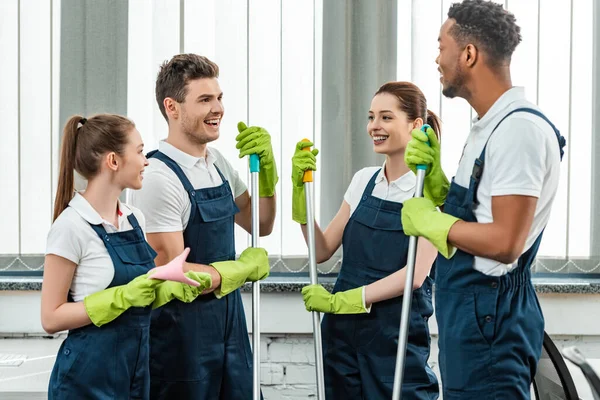 Smiling Multicultural Team Cleaners Talking While Standing Office — Stock Photo, Image