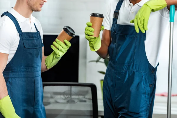 Cropped View Multicultural Cleaners Holding Coffee Office — Stock Photo, Image