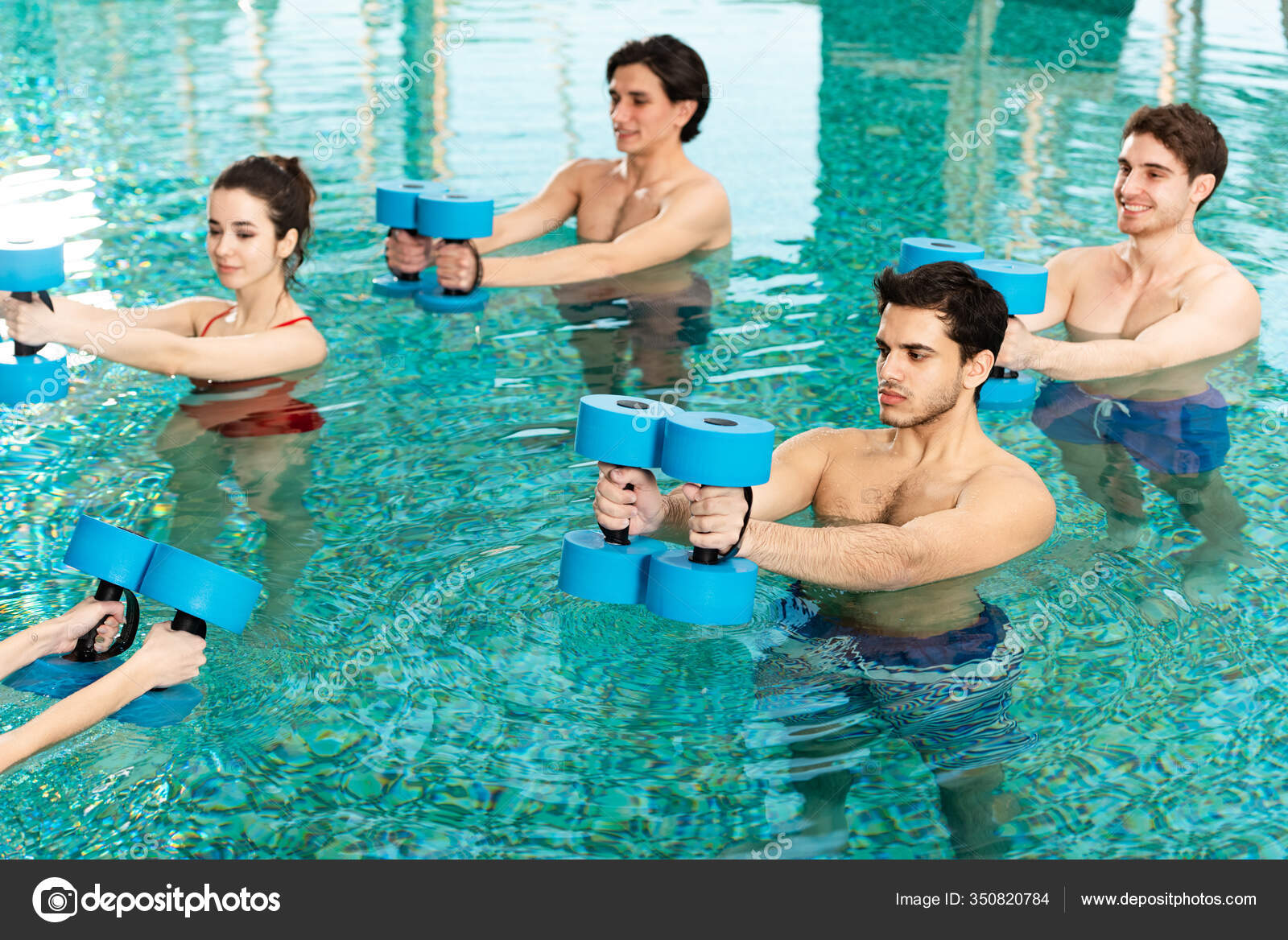 Group Young People Exercising Barbells Swimming Pool Stock Photo by