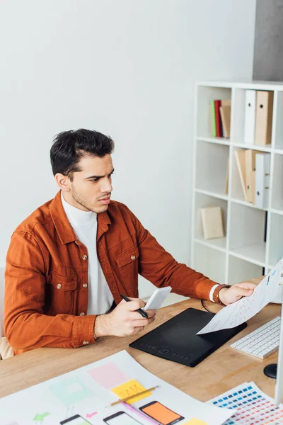 Handsome Designer Holding Smartphone While Working Website Sketches Table Office — Stock Photo, Image