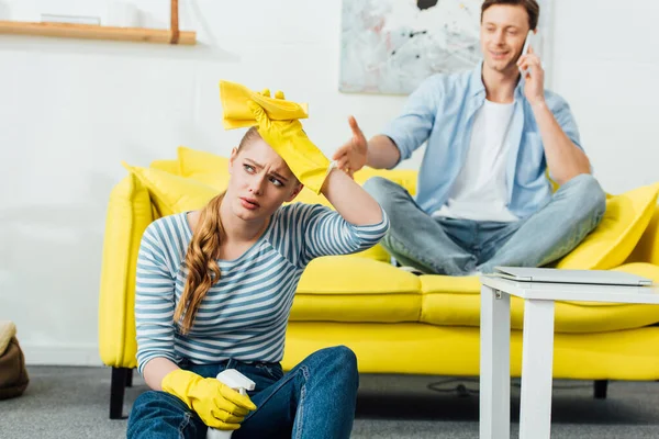 Selective Focus Tired Woman Cleaning Supplies Sitting Floor Boyfriend Talking — Stock Photo, Image