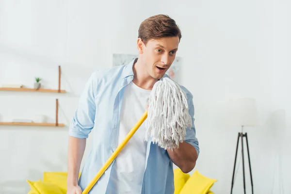 Handsome Man Singing While Holding Mop Living Room — Stock Photo, Image