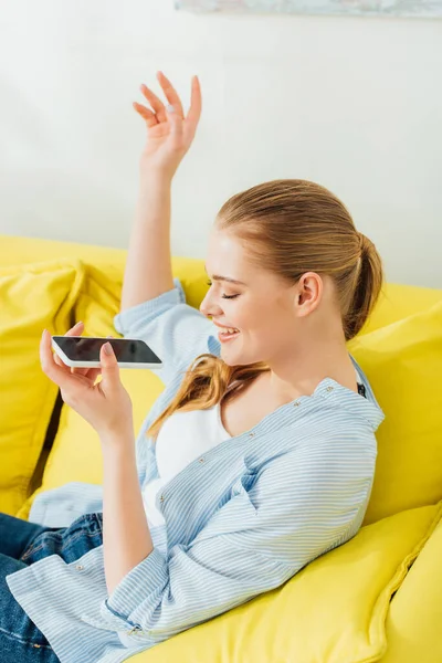 Side View Happy Girl Holding Smartphone Couch — Stock Photo, Image