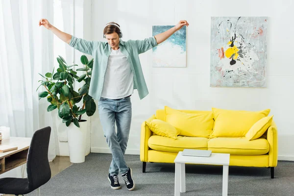 Handsome Man Dancing While Listening Music Headphones Living Room — Stock Photo, Image