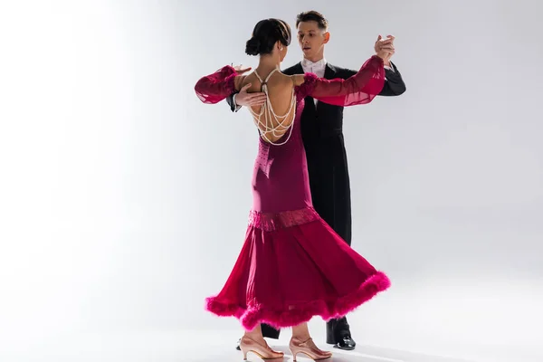 Elegant Young Couple Ballroom Dancers Red Dress Suit Dancing White — Stock Photo, Image