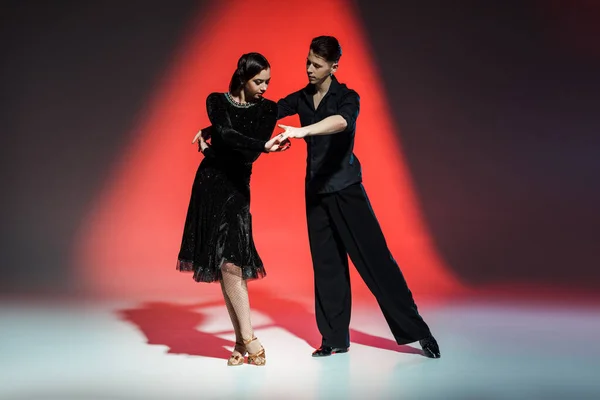 Elegant Young Couple Ballroom Dancers Dancing Red Light — Stock Photo, Image