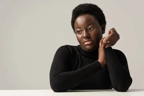 Pensive African American Woman Black Turtleneck Sitting Table Isolated Grey — Stock Photo, Image