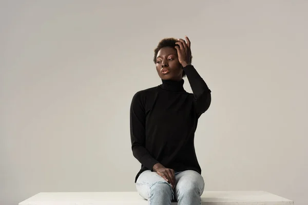 Tender African American Girl Jeans Black Turtleneck Sitting White Cube — Stock Photo, Image