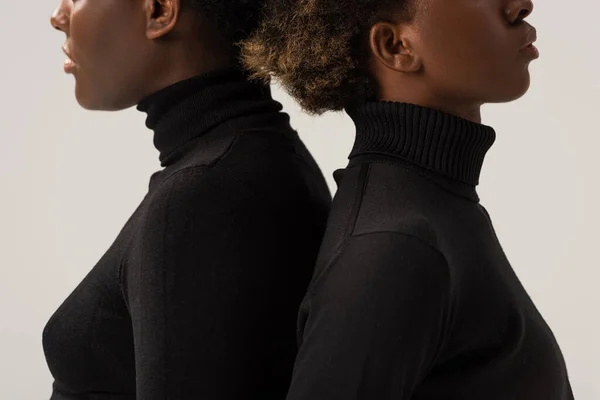 Cropped View African American Friends Black Turtlenecks Standing Back Back — Stock Photo, Image