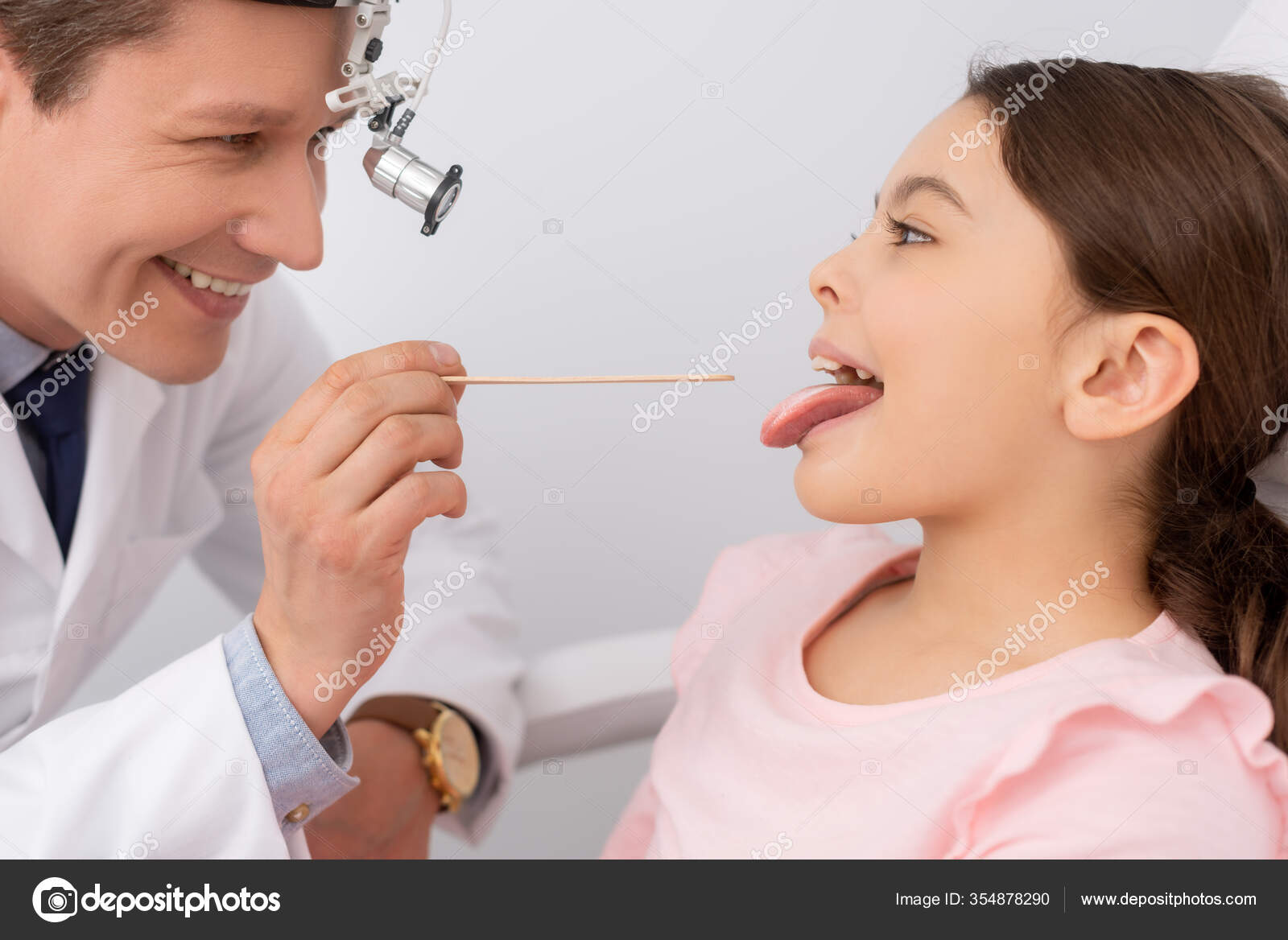 Smiling Ent Physician Examining Throat Cute Child Tongue Depressor