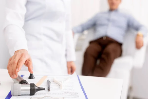 Selective Focus Ent Physician Taking Otoscope Patient Sitting Medical Chair — Stock Photo, Image