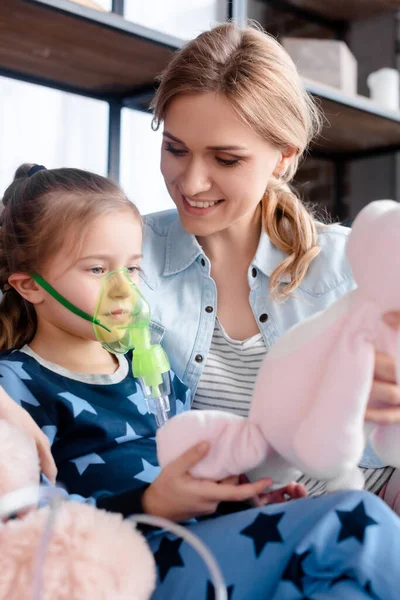 Selective Focus Asthmatic Kid Using Respiratory Mask Looking Soft Toy — Stock Photo, Image