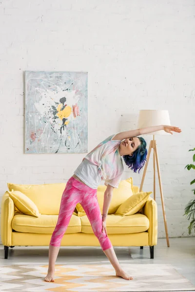 Girl Colorful Hair Warming Outstretched Hand Living Room — Stock Photo, Image