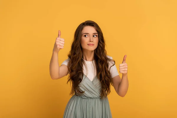 Beautiful Smiling Spring Woman Showing Thumbs Isolated Yellow — Stock Photo, Image