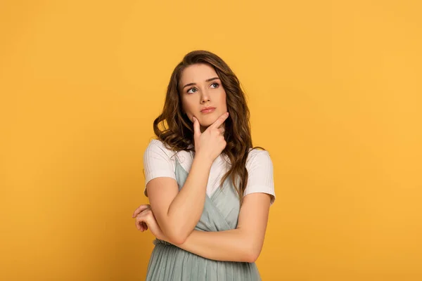 Thoughtful Spring Woman Long Hair Isolated Yellow — Stock Photo, Image