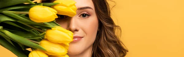 Panoramic Shot Smiling Girl Holding Tulip Flowers Isolated Yellow — Stock Photo, Image