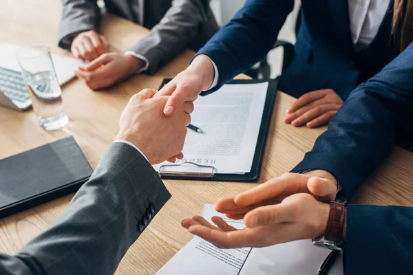 Cropped View Recruiter Shaking Hands Employee Colleagues Resume Table — Stock Photo, Image