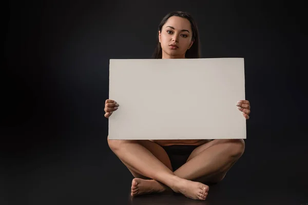 Front View Size Girl Sitting Crossed Legs Holding Blank Placard — Stock Photo, Image