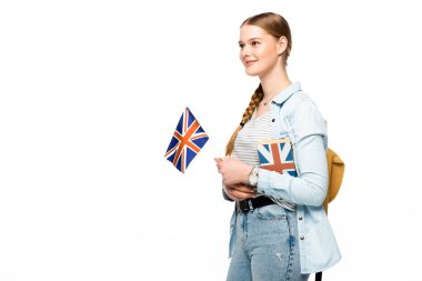 smiling pretty student with backpack holding book and British flag isolated on white clipart