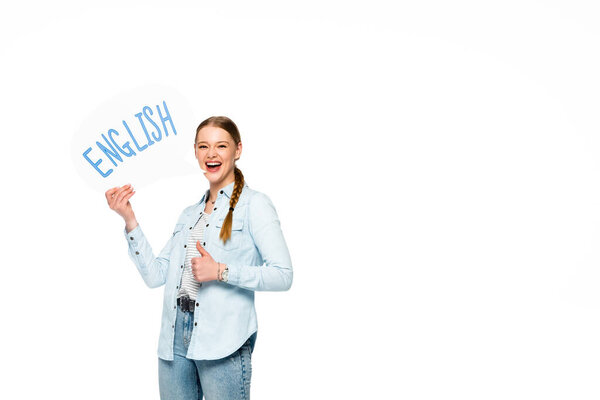 smiling girl with braid holding speech bubble with English lettering and showing thumb up isolated on white