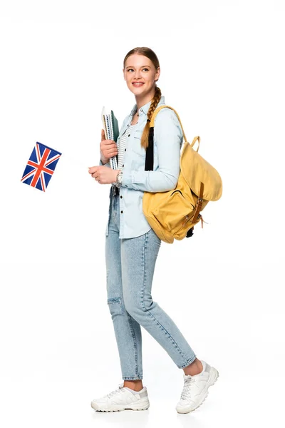 Uśmiechnięta Dziewczyna Plecakiem Trzymając Copybooks Flagi Izolowane Białym — Zdjęcie stockowe