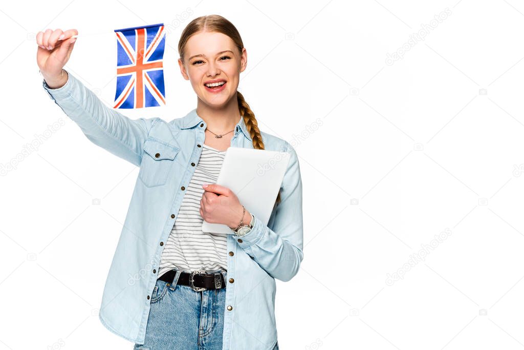 happy pretty girl with braid holding digital tablet and uk flag isolated on white