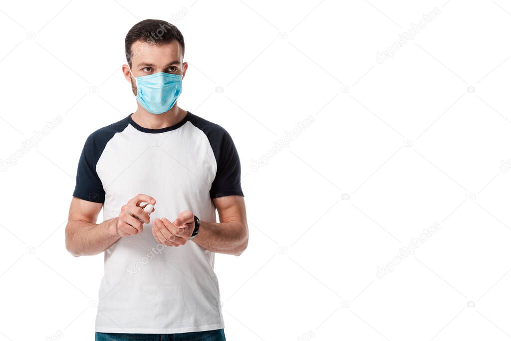 man in medical mask holding spray bottle with hand sanitizer isolated on white 