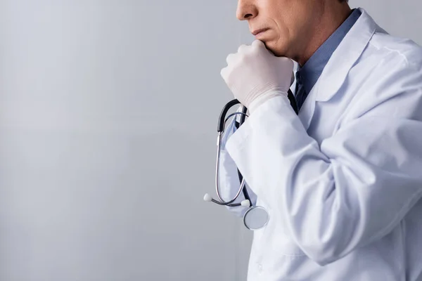 Cropped View Pensive Mature Doctor White Coat Grey — Stock Photo, Image