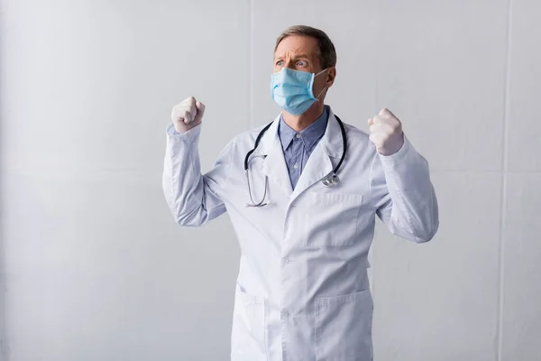 Stressed Middle Aged Doctor Blue Medical Mask Standing Clenched Fists — Stock Photo, Image