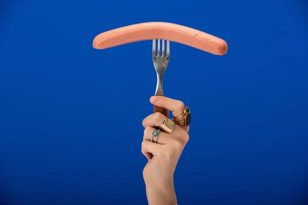 Cropped View Woman Rings Fingers Holding Fork Sausage Blue — Stock Photo, Image