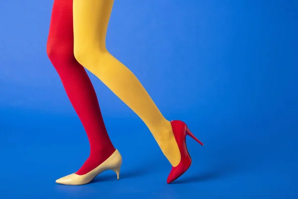Cropped View Model Yellow Red Tights Shoes Posing Blue — Stock Photo, Image