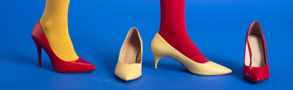 Panoramic Shot Woman Red Yellow Tights Shoes Posing Blue — Stock Photo, Image