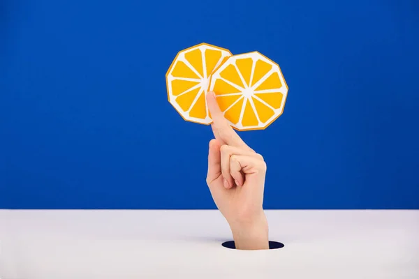 Cropped View Woman Holding Paper Cut Orange Isolated Blue — Stock Photo, Image
