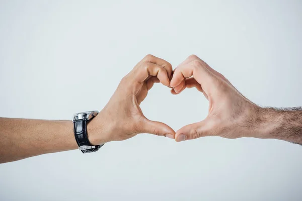 Ausgeschnittene Ansicht Von Männerhänden Die Herzzeichen Isoliert Auf Grau Zeigen — Stockfoto