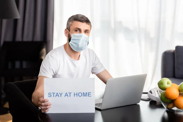 Freelancer Medical Mask Holding Card Stay Home Lettering Laptop Fruits — Stock Photo, Image