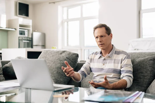 Selective Focus Man Gesturing Laptop While Having Video Call — Stock Photo, Image