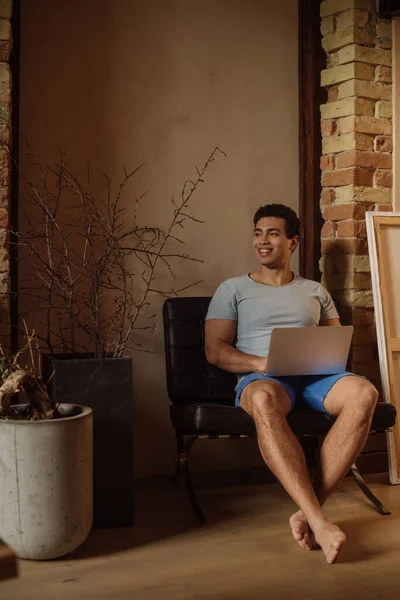 Happy Emotional Mixed Race Man Chilling Laptop Home Self Isolation — Stock Photo, Image