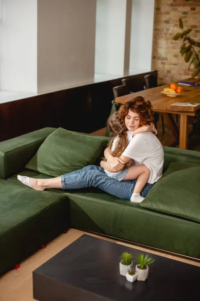 Cute Daughter Hugging Curly Mother — Stock Photo, Image