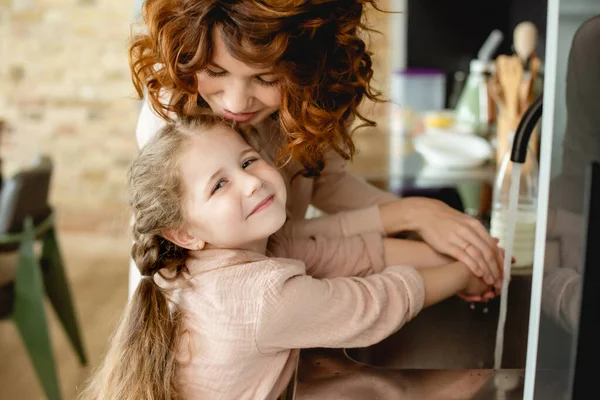 Curly Mother Happy Daughter Washing Hands — Stock Photo, Image