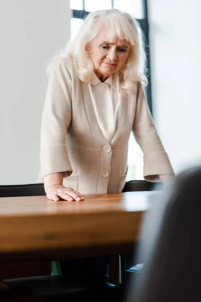 Upset Elderly Woman Standing Table Self Isolation Selective Focus — Stock Photo, Image